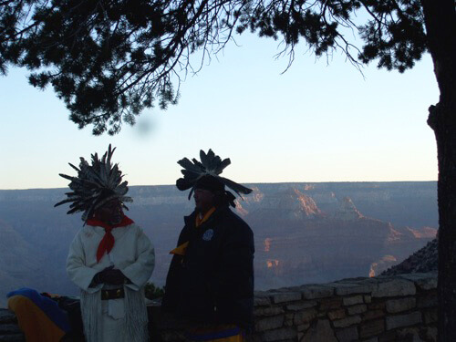 Havasupai indigenous people at dawn ceremony at rim of Grand Canyon by Sandra Cosentino.