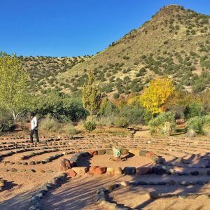 1 person waking a Sedona 7-path labyrinth. This is a ceremony to walk your new path during shamanic journey outdoor workshops in Sedona.