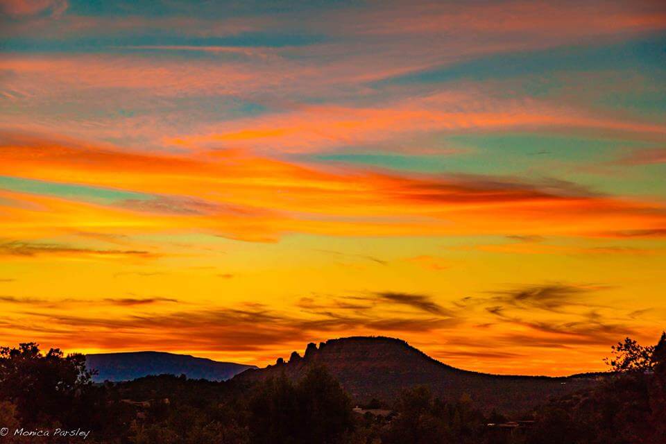 Sedona sunset with vivid teal and peach colors symbolizes inspirational Sedona fall mystic vision retreats and special outdoor circles