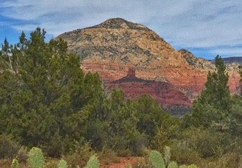 View of Thunder Mountain and Chimney Rock, Sedona from a scenic overlook where we do circles and outdoor seminars.